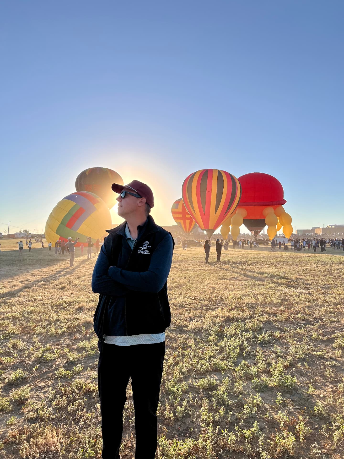 Jackson Granger at a hot air balloon festival at sunrise